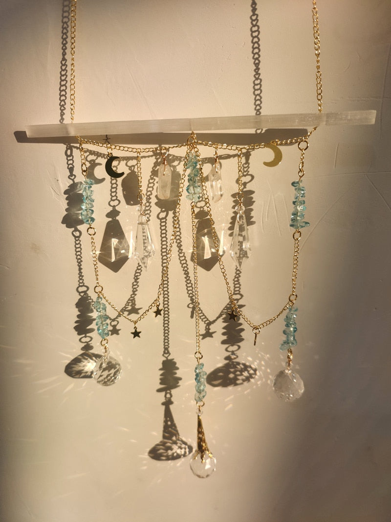 Selenite bar with a variety of crystals and K9