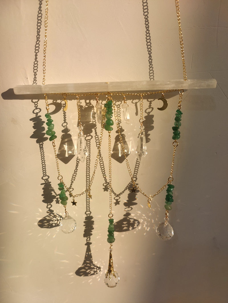 Selenite bar with a variety of crystals and K9